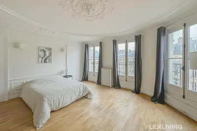 Un ou plusieurs lits dans un hébergement de l'établissement Flexliving - room - Turbigo