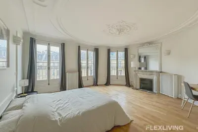 Un ou plusieurs lits dans un hébergement de l'établissement Flexliving - room - Turbigo