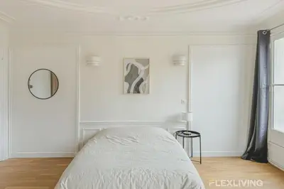 Un ou plusieurs lits dans un hébergement de l'établissement Flexliving - room - Turbigo