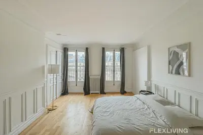 Un ou plusieurs lits dans un hébergement de l'établissement Flexliving - room - Turbigo