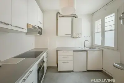 Cuisine ou kitchenette dans l'établissement Flexliving - room - Turbigo