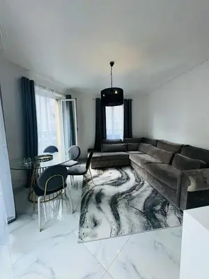 Coin salon dans l'établissement Appartement parisien