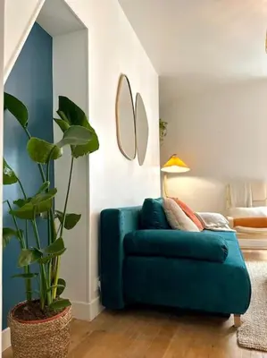 Coin salon dans l'établissement Celine 3 La perle Bleue - appartement cosy à La Défense