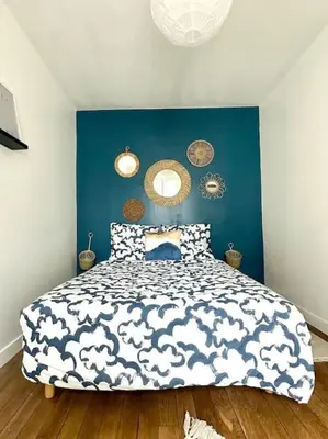 Un ou plusieurs lits dans un hébergement de l'établissement Celine 3 La perle Bleue - appartement cosy à La Défense