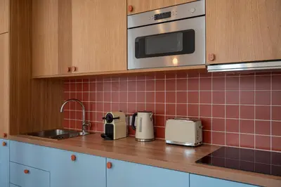 Cuisine ou kitchenette dans l'établissement New Flat Terracotta Style - Greater Paris district