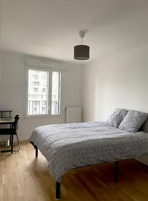 Un ou plusieurs lits dans un hébergement de l'établissement 3 pièces tout neuf de haut standing à 10mn de Paris avec terrasse vue Sacré Coeur