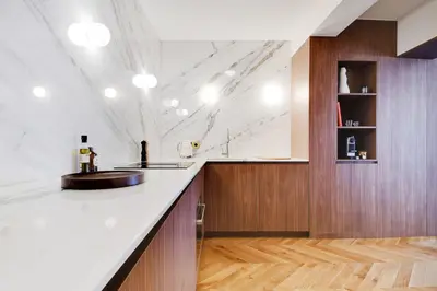Cuisine ou kitchenette dans l'établissement ONIRI - Serviced Apartment in Saint Germain