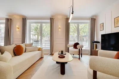 Coin salon dans l'établissement ONIRI - Serviced Apartment in Saint Germain