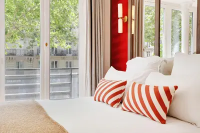 Un ou plusieurs lits dans un hébergement de l'établissement ONIRI - Serviced Apartment in Saint Germain