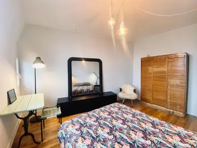 Un ou plusieurs lits dans un hébergement de l'établissement 3 pièces lumineux paris Montmartre