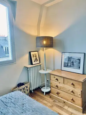 Un ou plusieurs lits dans un hébergement de l'établissement 3 pièces lumineux paris Montmartre