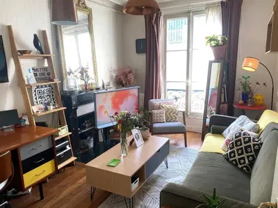Coin salon dans l'établissement Nice and cosy apartment Ménilmontant