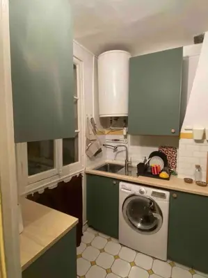 Cuisine ou kitchenette dans l'établissement Nice and cosy apartment Ménilmontant