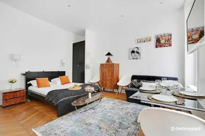 Coin salon dans l'établissement Charming studio - 3P - Le Marais