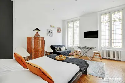 Un ou plusieurs lits dans un hébergement de l'établissement Charming studio - 3P - Le Marais