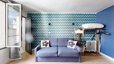 Coin salon dans l'établissement Bluestay 11 - Charmant Studio au Cœur de Paris
