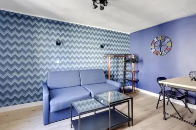 Coin salon dans l'établissement Bluestay 11 - Charmant Studio au Cœur de Paris