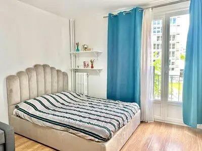 Un ou plusieurs lits dans un hébergement de l'établissement Modern studio near Gare de Lyon Bercy F1