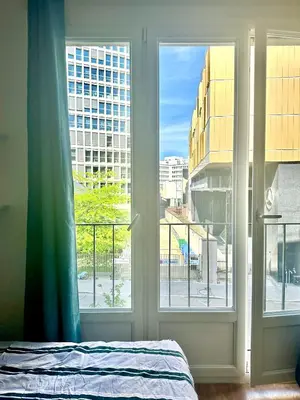 Un ou plusieurs lits dans un hébergement de l'établissement Modern studio near Gare de Lyon Bercy F1