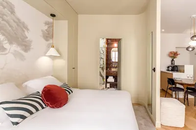 Un ou plusieurs lits dans un hébergement de l'établissement Habitat Parisien - Grands Boulevards Montorgueil