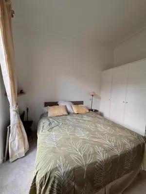 Un ou plusieurs lits dans un hébergement de l'établissement Appartement 2 pièces charmant et paisible vue sur jardin