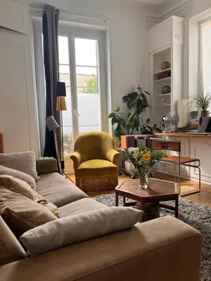 Coin salon dans l'établissement Appartement 2 pièces charmant et paisible vue sur jardin