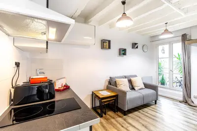Coin salon dans l'établissement GuestReady - Central Apt in Paris