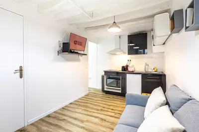 Cuisine ou kitchenette dans l'établissement GuestReady - Central Apt in Paris