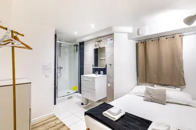 Un ou plusieurs lits dans un hébergement de l'établissement GuestReady - Central Apt in Paris