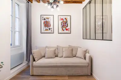 Coin salon dans l'établissement GuestReady - Appartement élégant au coeur de Paris