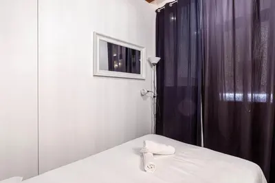 Un ou plusieurs lits dans un hébergement de l'établissement GuestReady - Appartement élégant au coeur de Paris