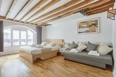 Coin salon dans l'établissement Charming Apartment Center of Paris By Studio Prestige