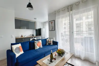 Coin salon dans l'établissement Appartement Chic