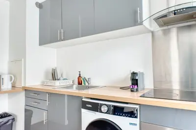 Cuisine ou kitchenette dans l'établissement Appartement Chic