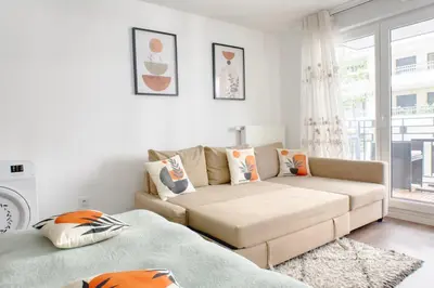 Coin salon dans l'établissement Appartement Elégant