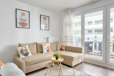 Coin salon dans l'établissement Appartement Elégant
