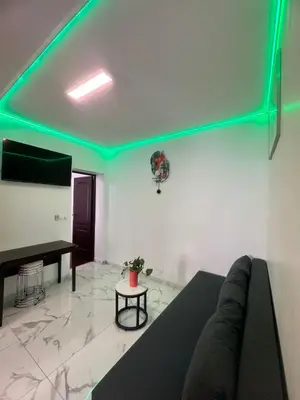 Coin salon dans l'établissement Excellent Appartement Rénové au Cœur de la Capitale