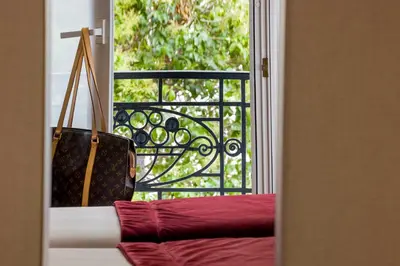 Un ou plusieurs lits dans un hébergement de l'établissement Hotel Charlemagne