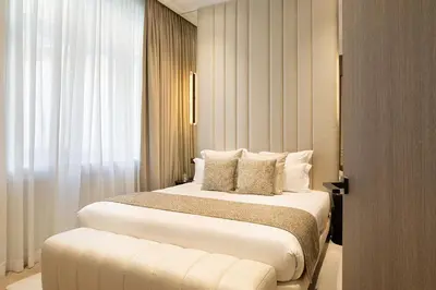 Un ou plusieurs lits dans un hébergement de l'établissement TheLander - Serviced Apartment in Champs Elysées