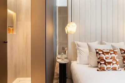 Un ou plusieurs lits dans un hébergement de l'établissement TheLander - Serviced Apartment in Champs Elysées