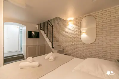 Un ou plusieurs lits dans un hébergement de l'établissement MBA - Cavalloti Splendide Appartement