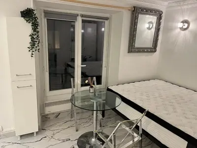 Un ou plusieurs lits dans un hébergement de l'établissement Studio à 2 minutes de lafayette
