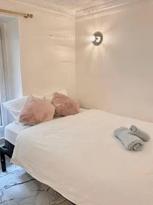 Un ou plusieurs lits dans un hébergement de l'établissement Studio à 2 minutes de lafayette