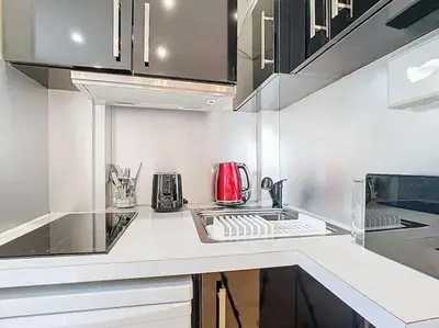 Cuisine ou kitchenette dans l'établissement Studio 49-Le Cocon-Métro à 1mn