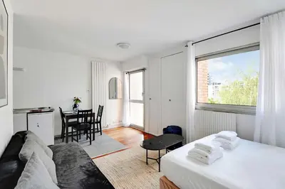 Un ou plusieurs lits dans un hébergement de l'établissement Stunning studio - 2P - La Vilette
