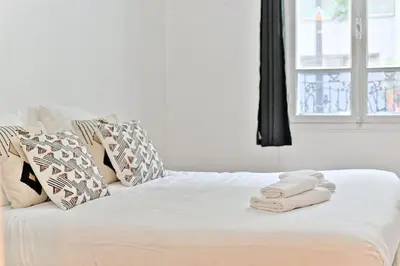 Un ou plusieurs lits dans un hébergement de l'établissement Appartement 2 chambres Pyrénées Alexandre Dumas-II