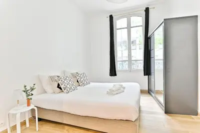 Un ou plusieurs lits dans un hébergement de l'établissement Appartement 2 chambres Pyrénées Alexandre Dumas-II
