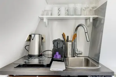 Cuisine ou kitchenette dans l'établissement Paris Marais Rosiers
