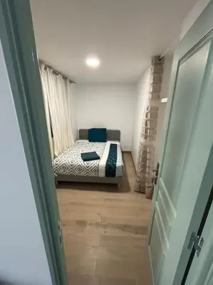 Un ou plusieurs lits dans un hébergement de l'établissement M2 Appart 3 chambres 5 min metro - PARC EXPO