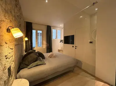 Un ou plusieurs lits dans un hébergement de l'établissement Louvre -Notre Dame 2BD, 2BATH AC